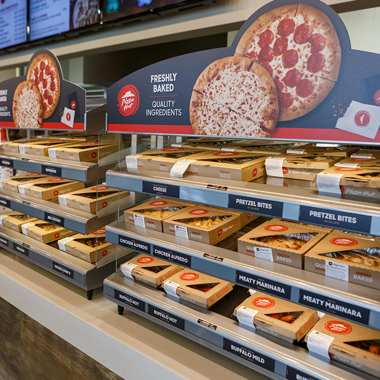 The pizza stand at Pizza Hut in the Campus Center filled with boxed pizzas.